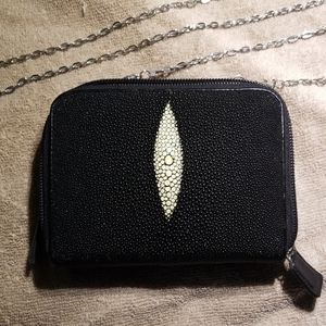 A genuine stingray, two zip or clutch purses